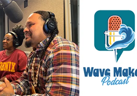 The Wave Makers Podcast logo features a retro-style orange and yellow microphone with black dots, partially wrapped in a stylized blue ocean wave. The microphone is set inside a teal speech bubble shape. Below, the words “Wave Makers” appear in bold blue letters, with “Podcast” in a flowing script font.