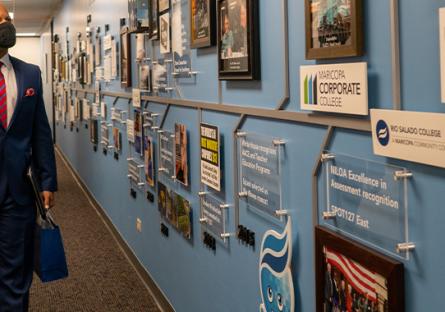 photo of Tempe Mayor Corey Woods looking at a wall display in the Rio Tower building