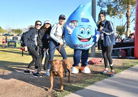 President Kate Smith, Rio mascot SPLASH, and runners at fun run