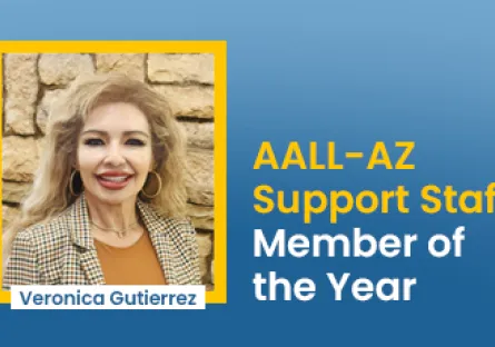 Veronica Gutierrez stands with fellow adult education professionals at the Arizona Department of Education Adult Education Institute in Phoenix. The group poses in front of an Adult Education Services backdrop.