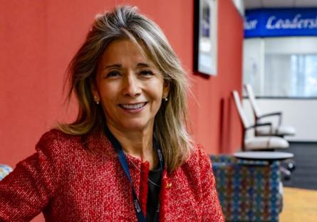 Dr. Stella Perez at Rio Salado Tempe headquarters near colorful Leadership meeting rooms