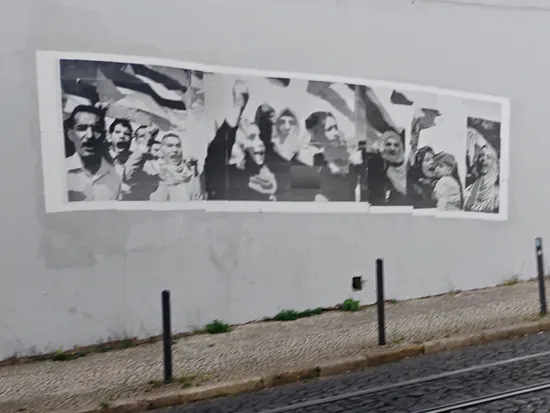 people collage poster on wall