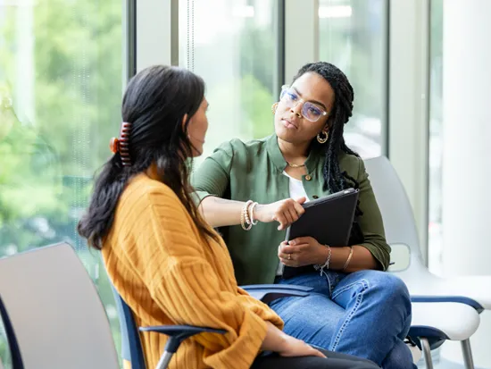 Two women talking