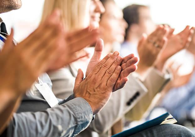 Group of people clapping