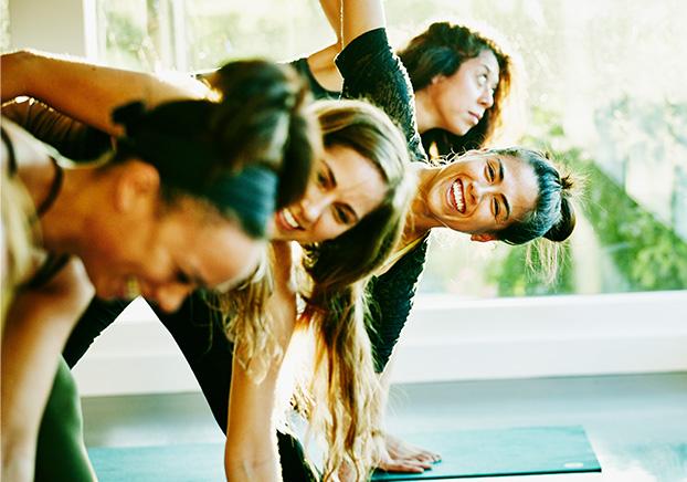 Group at gym stretching